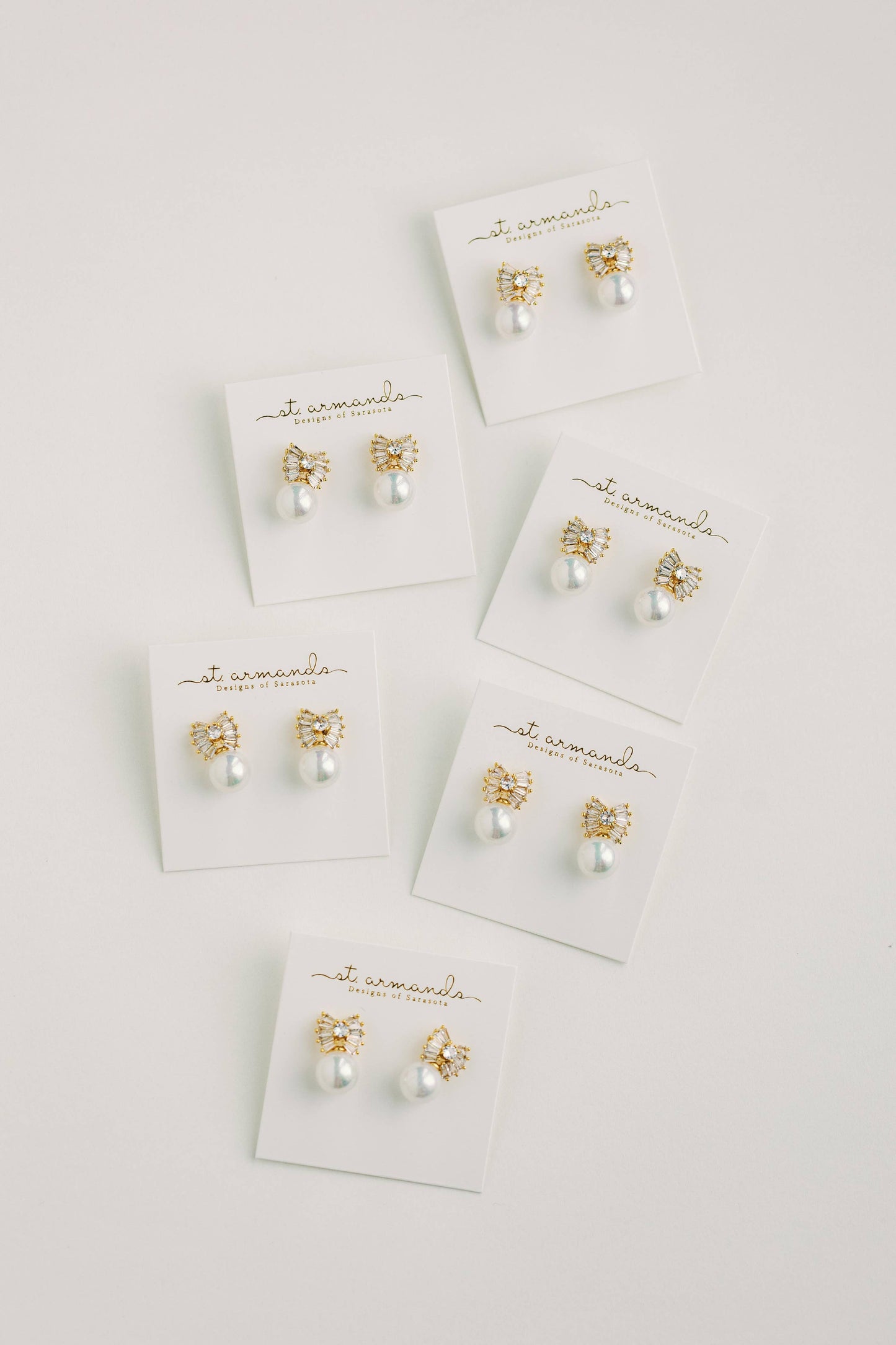 St Armands Designs of Sarasota - Gold Pearl Sparkler Statement Bow Earrings